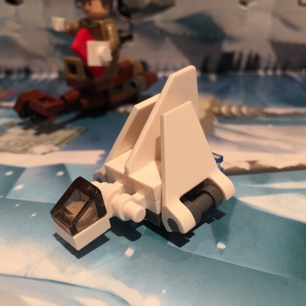 LEGO micro-build of an Imperial shuttle in white. This one is much smaller and has its two wings folded up for landing.