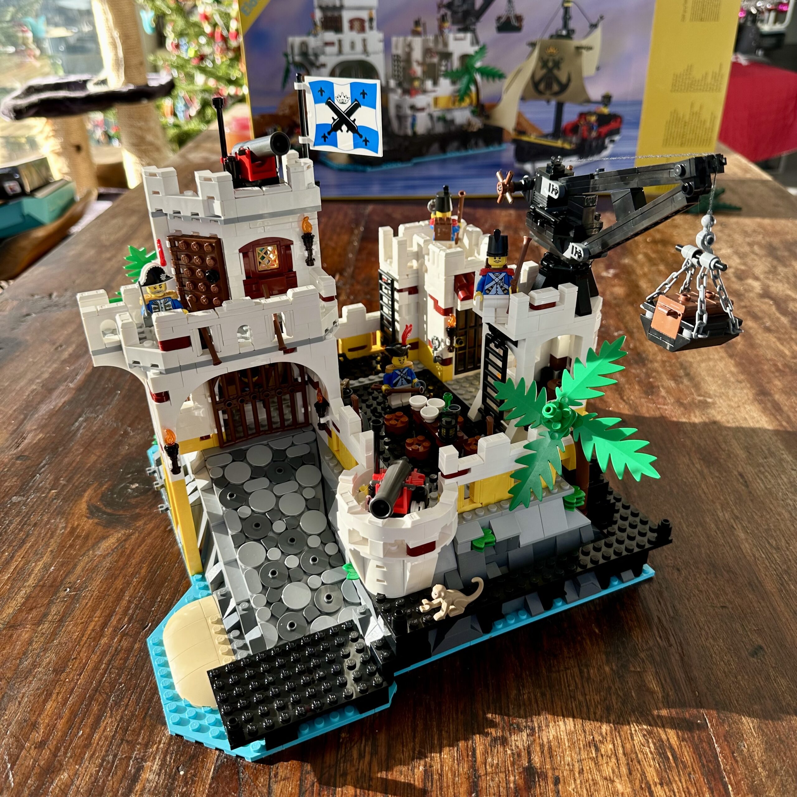 The completed LEGO set 10320 Eldorado Fortress with the sections arranged to form an entirely enclosed square fortress.